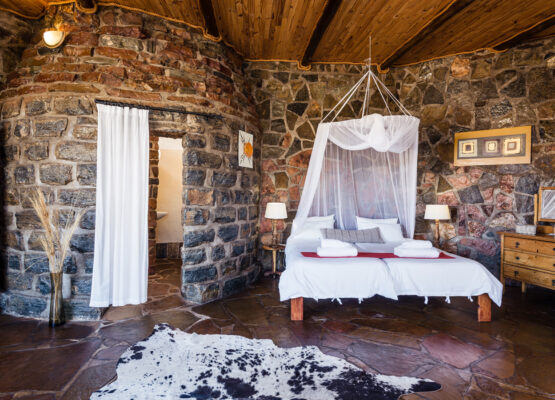 Inside view Rock Chalet with double bed