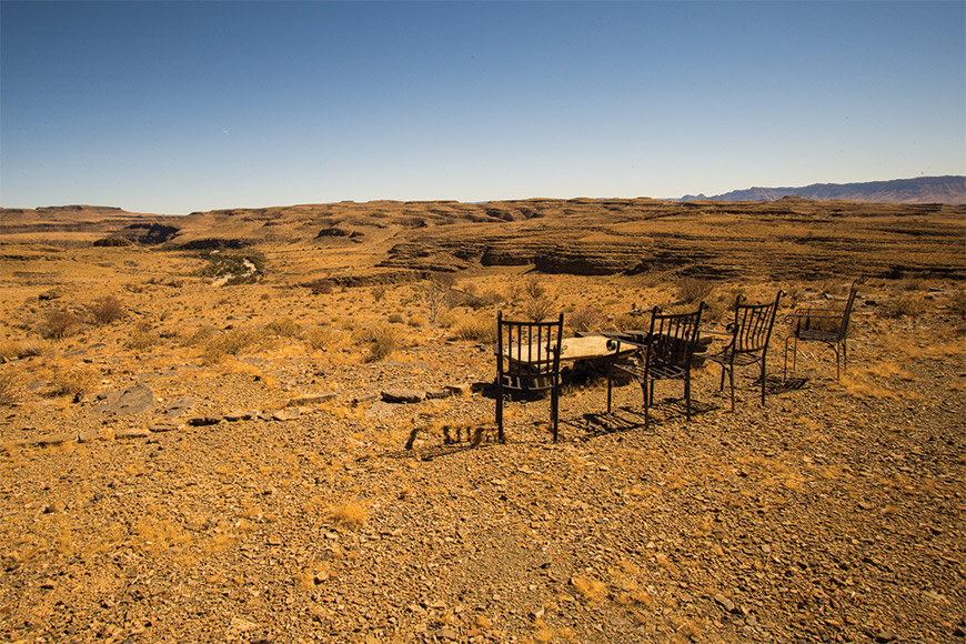 Sundowner place with chairs with scenic view into valley and mountains