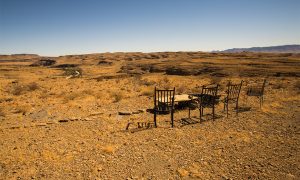 Sundowner place with chairs with Tsaris mountains in background at Zebra River Lodge